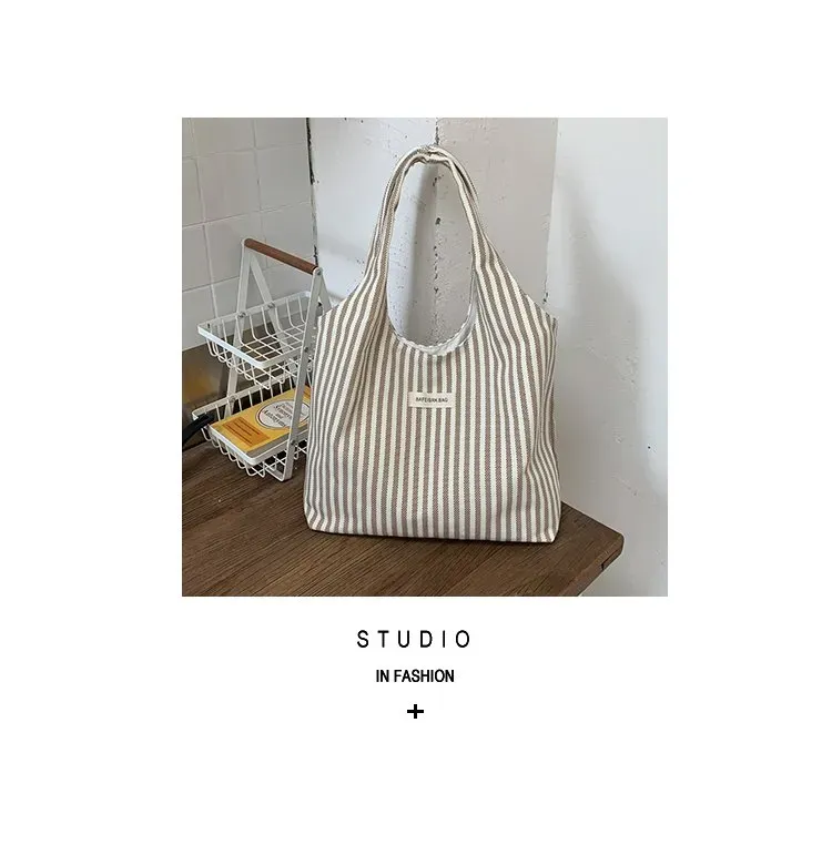Tas Selempang Wanita Bahan PU Sintetis Motif Garis Warna Putih Model Hobo Tali Grosir Import