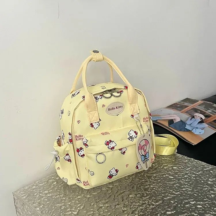 Tas Ransel Wanita Bahan Nylon Motif Print Warna Kuning Bentuk Kotak Tali Panjang Grosir Import