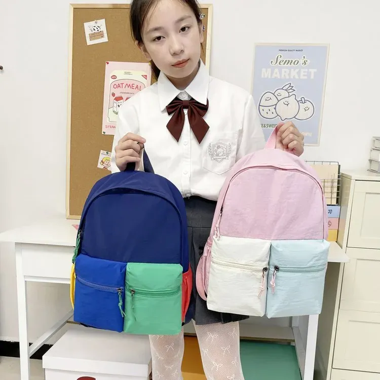Tas Ransel Wanita Bahan Nylon Polos Warna Ungu Bentuk Kotak Tali Panjang Grosir Import