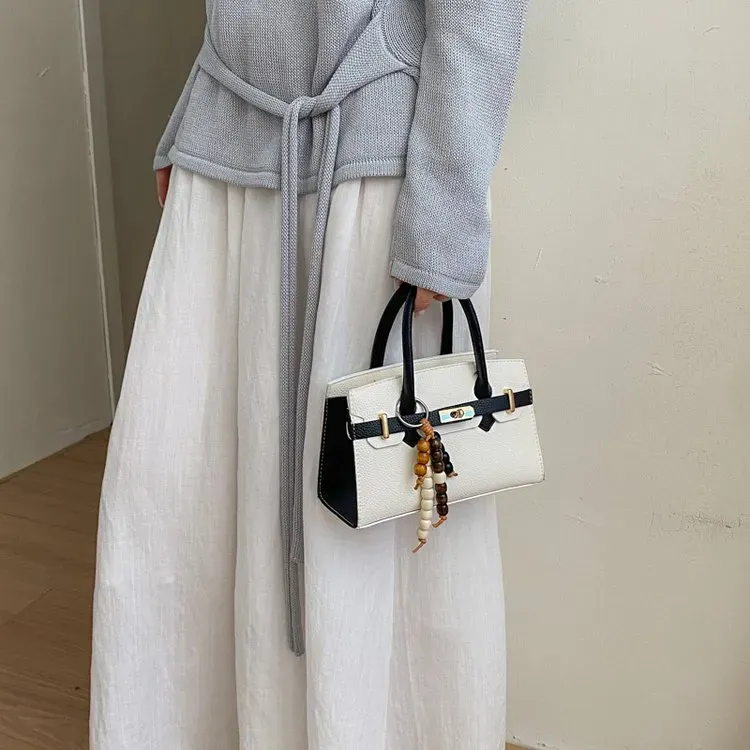 Tas Selempang Wanita Bahan PU Sintetis Polos Warna Hitam Bentuk Kotak Tali Warna Pink Grosir