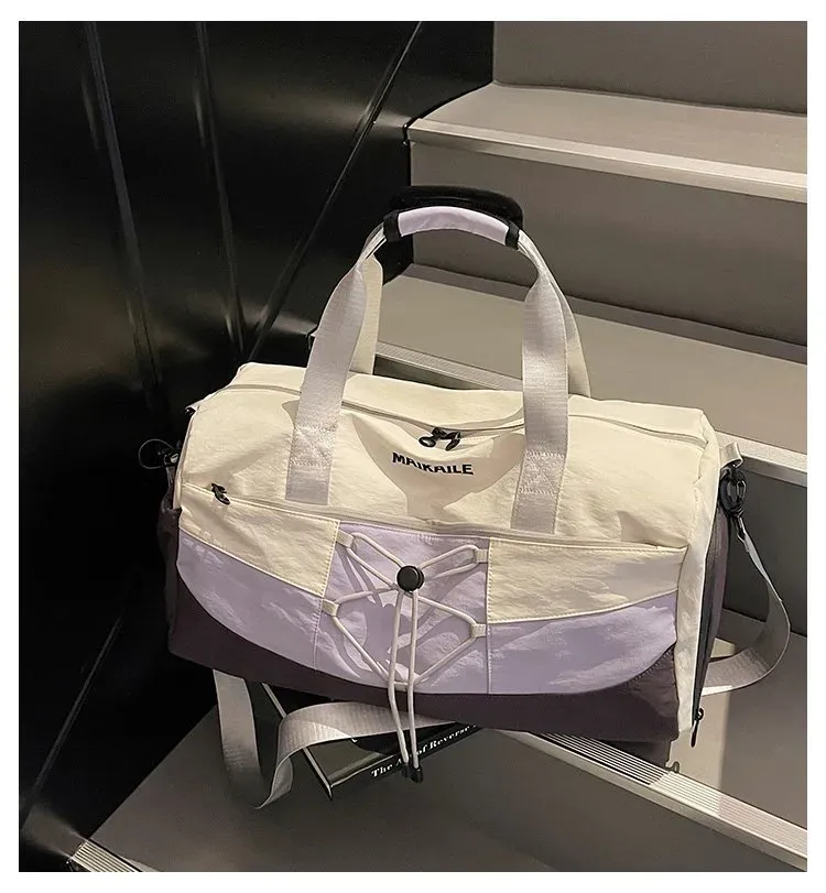 Tas Selempang Wanita Bahan Nylon Polos Warna Ungu Bentuk Kotak Tali Panjang untuk Travel
