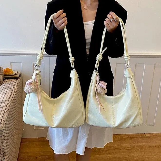 Tas Selempang Wanita Bahan PU Sintetis Polos Warna Biru Model Hobo Tali Panjang kategori tas selempang grosir