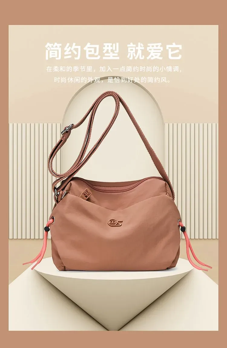 Tas Selempang Wanita Bahan Nylon Warna Merah Resleting Grosir Import