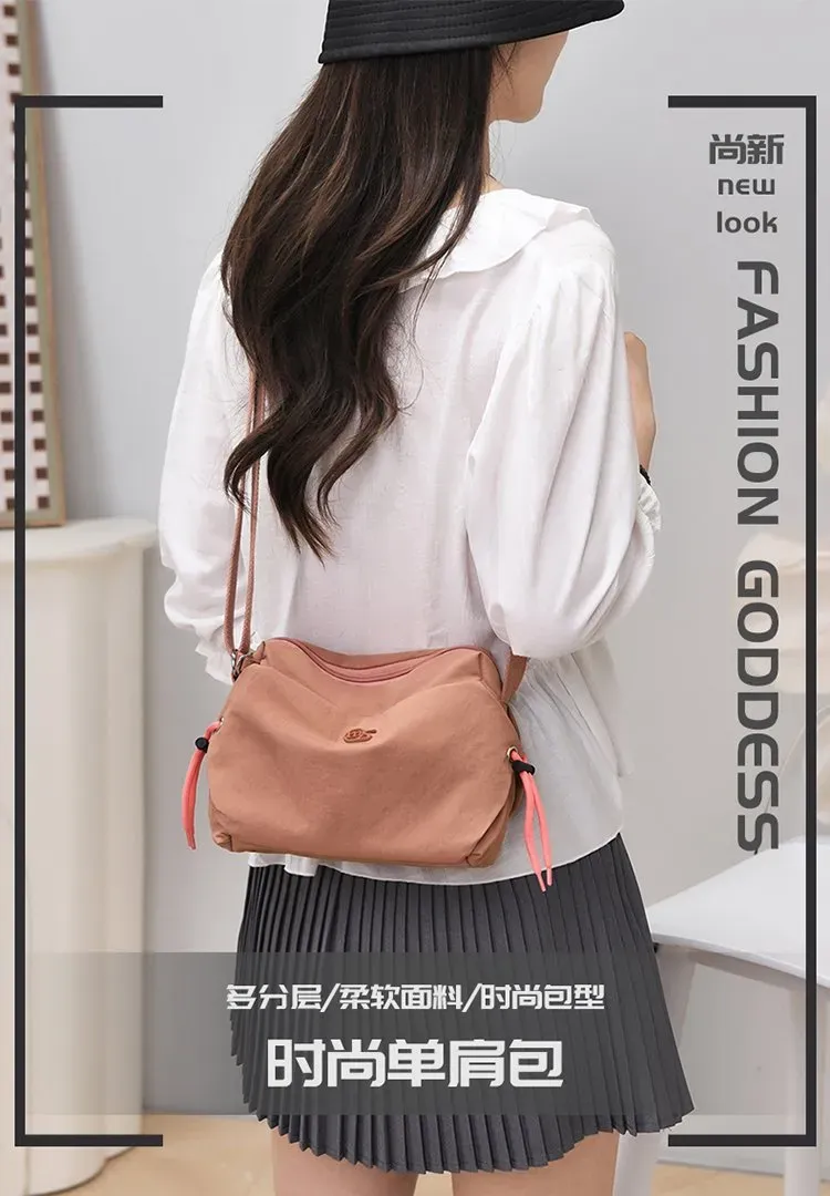 Tas Selempang Wanita Bahan Nylon Warna Merah Resleting Grosir Import kategori tas selempang grosir