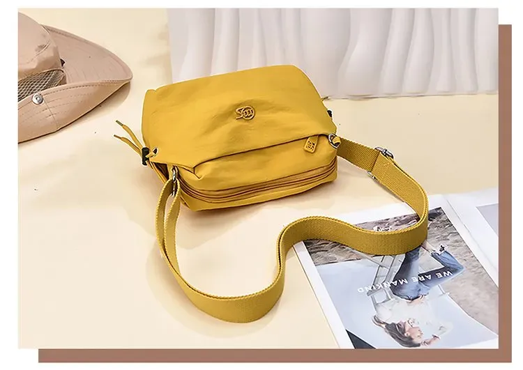 Tas Selempang Wanita Bahan Nylon Warna Merah Resleting Grosir Import