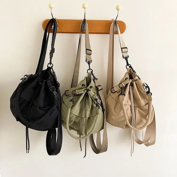Tas Bucket Wanita Bahan Nylon Polos Warna Cokelat Bentuk Bucket Tali Panjang Grosir Import