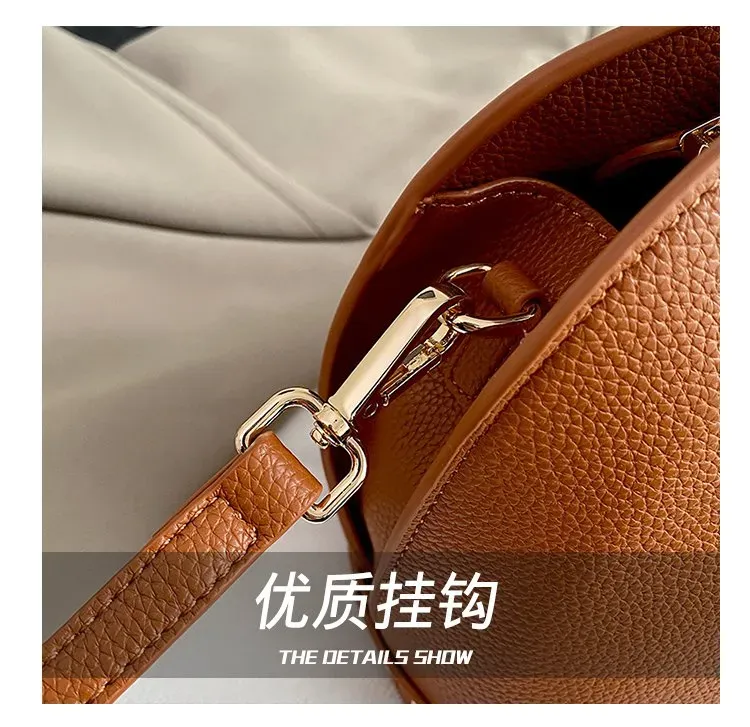 Tas Selempang Wanita Bahan PU Sintetis Polos Bentuk Bulat Tali Panjang Resleting Grosir Import