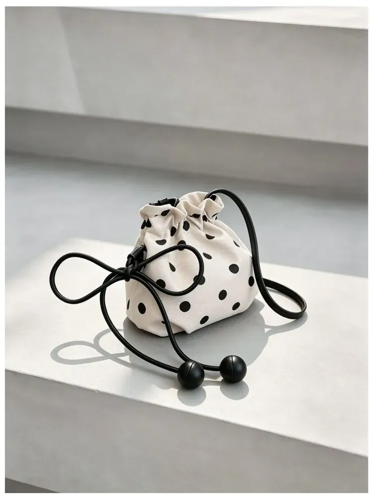 Tas Selempang Wanita Bahan PU Sintetis Motif Polkadot Warna Putih Bentuk Bulat Katalog Grosir