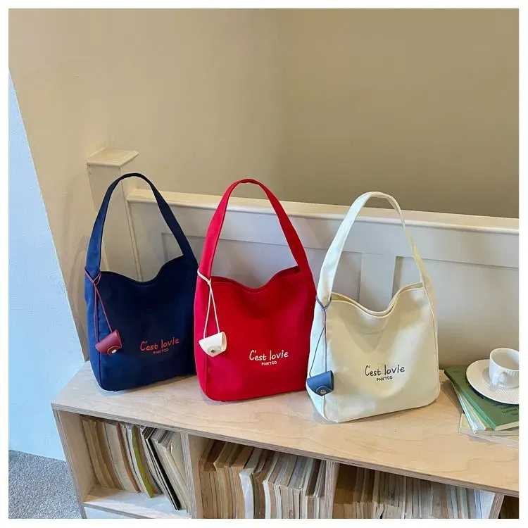 Tas Selempang Wanita Bahan PU Sintetis Polos Warna Merah Model Hobo Tali Panjang Grosir Import