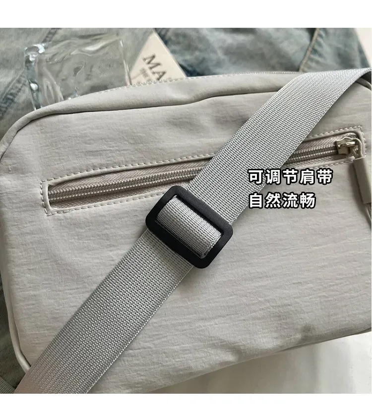 Tas Selempang Wanita Bahan Nylon Polos Warna Abu-Abu Bentuk Kotak Tali Lebar Resleting Grosir
