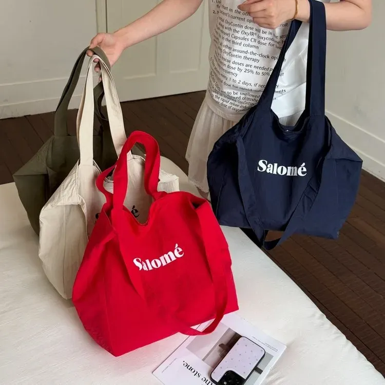 Tas Bucket Wanita Bahan Nylon Polos Warna Merah Bentuk Bucket Tali Panjang Casual Grosir Import