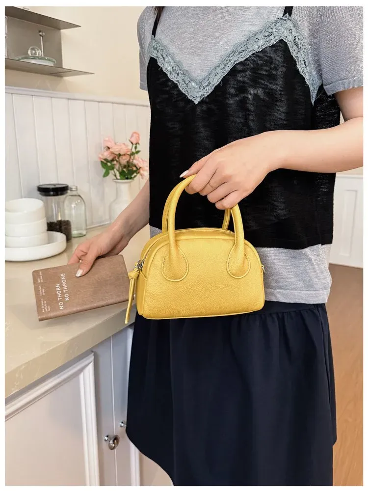 Tas Selempang Wanita Bahan PU Sintetis Polos Warna Kuning Bentuk Bulat Tali Grosir Import