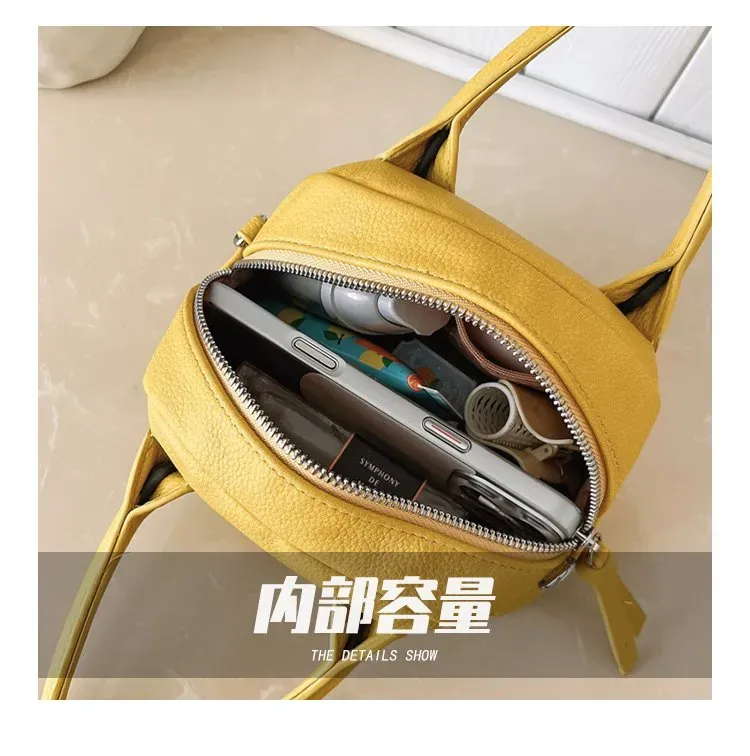 Tas Selempang Wanita Bahan PU Sintetis Polos Warna Kuning Bentuk Bulat Tali Grosir Import