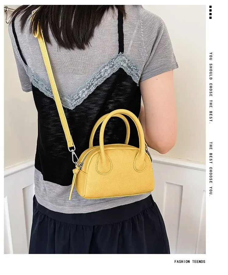 Tas Selempang Wanita Bahan PU Sintetis Polos Warna Kuning Bentuk Bulat Tali Grosir Import