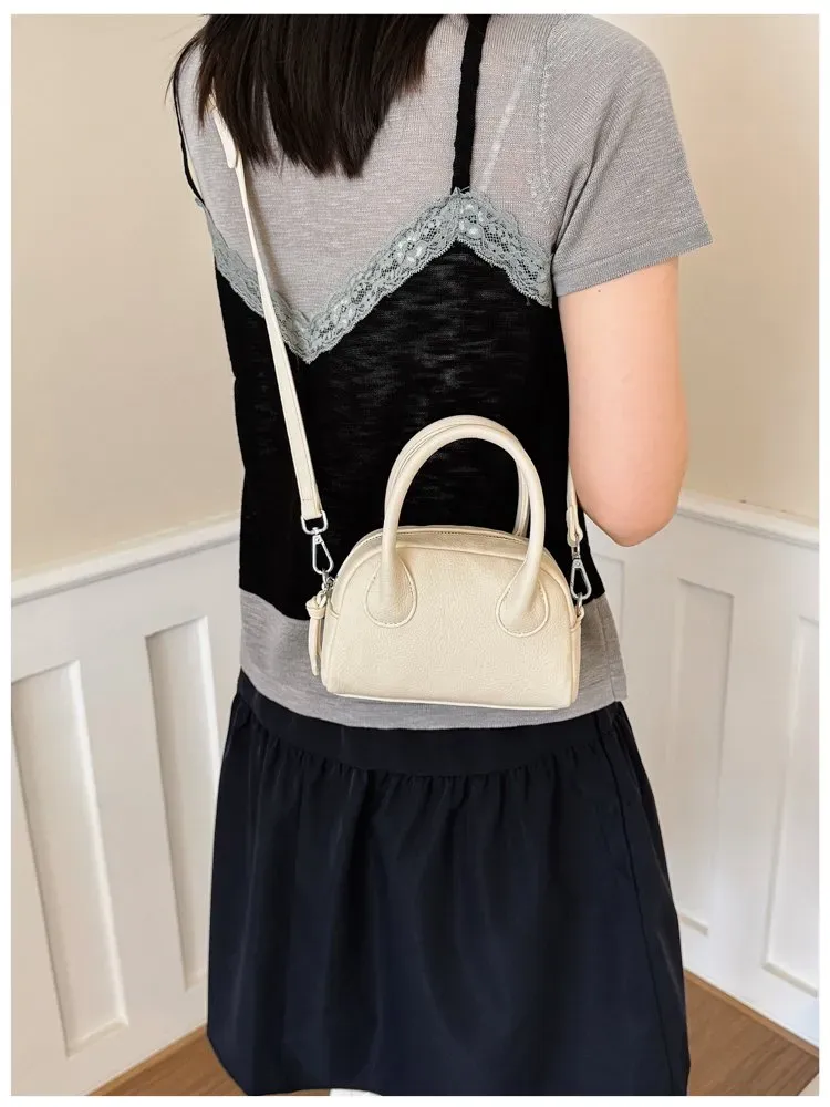 Tas Selempang Wanita Bahan PU Sintetis Polos Warna Kuning Bentuk Bulat Tali Grosir Import