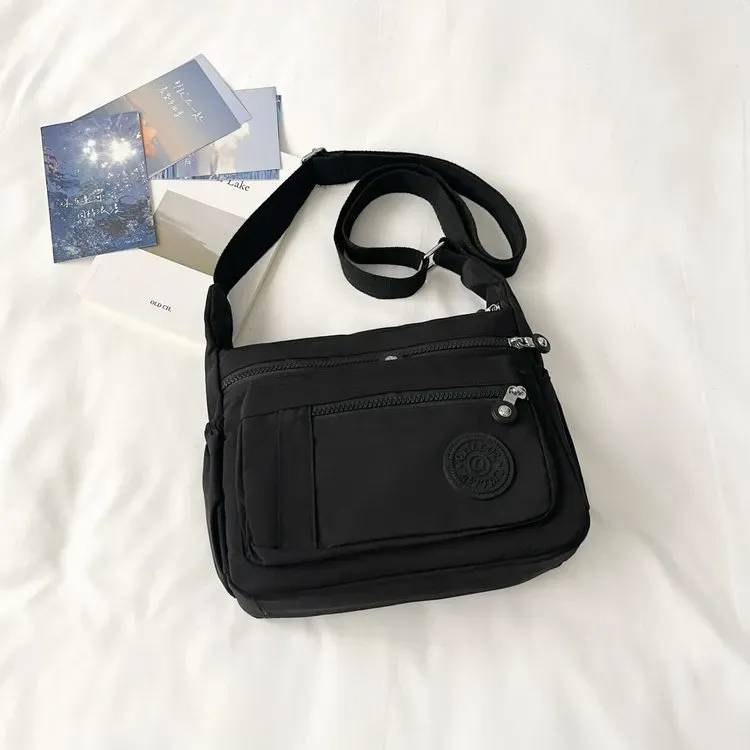 Tas Selempang Wanita Bahan Nylon Polos Warna Hitam Bentuk Kotak Tali Lebar Stok Grosir