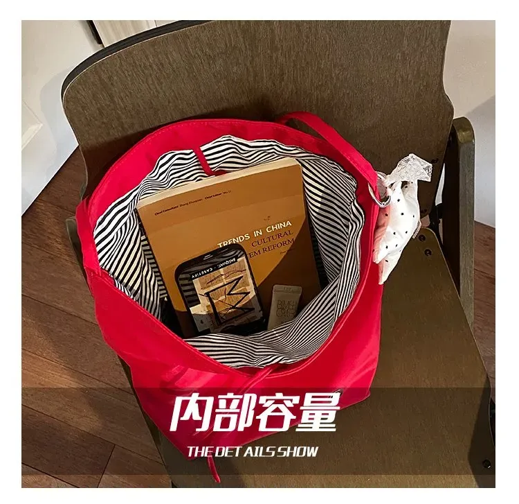 Tas Selempang Wanita Bahan Nylon Polos Warna Merah Bentuk Bulat Tali Panjang Grosir Import