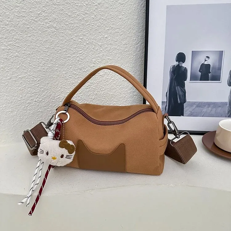 Tas Selempang Wanita Bahan PU Sintetis Polos Warna Hitam Bentuk Bulat Tali Lebar Grosir Import