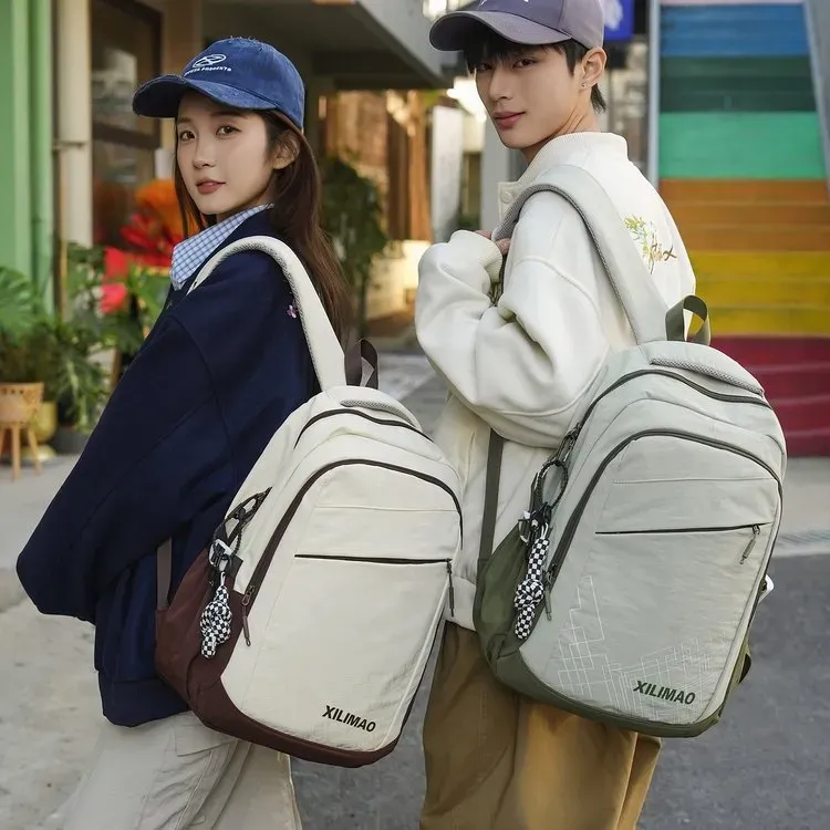 Tas Ransel Wanita Bahan Nylon Polos Warna Abu-Abu Bentuk Kotak Tali Lebar Grosir Import
