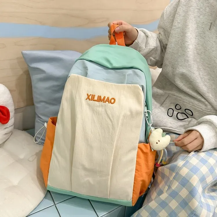 Tas Ransel Wanita Bahan Nylon Polos Warna Abu-Abu Bentuk Kotak Tali Lebar Grosir Import