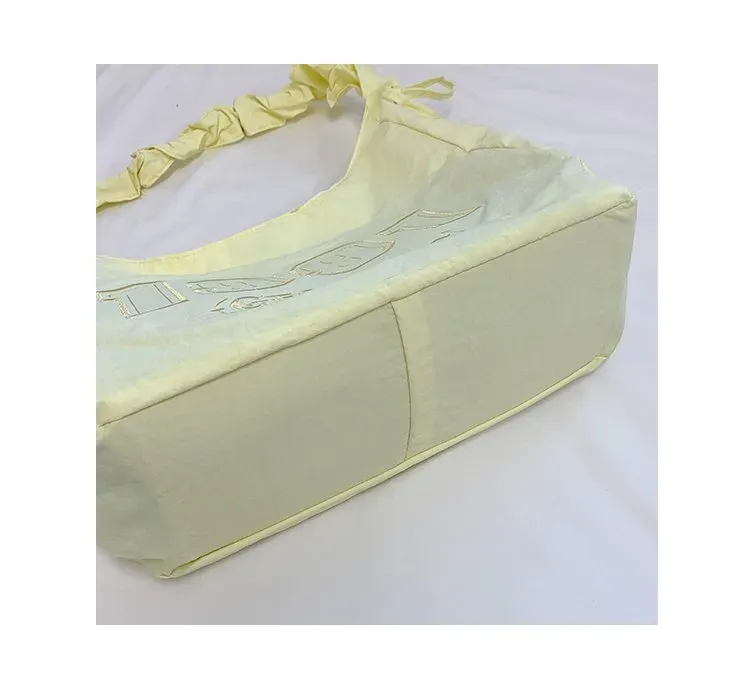 Tas Selempang Wanita Bahan Nylon Polos Warna Kuning Model Hobo Tali Serut Model Grosir Import
