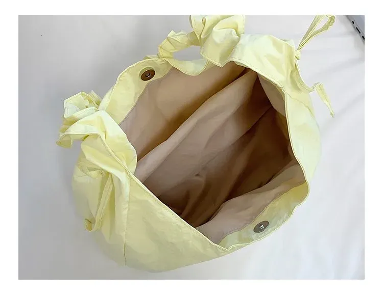 Tas Selempang Wanita Bahan Nylon Polos Warna Kuning Model Hobo Tali Serut Model Grosir Import