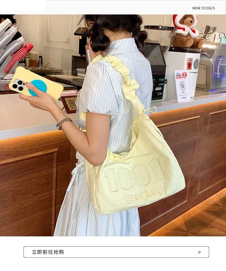 Tas Selempang Wanita Bahan Nylon Polos Warna Kuning Model Hobo Tali Serut Model Grosir Import