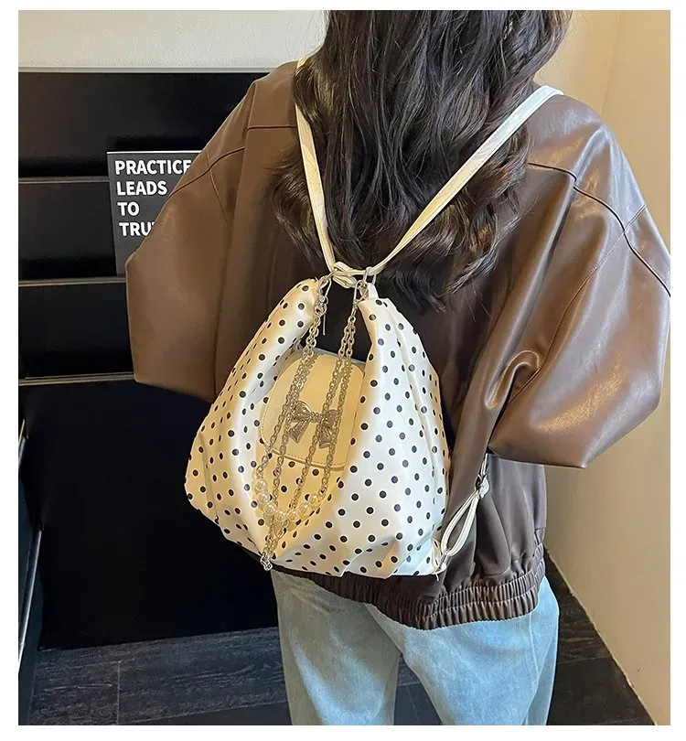 Tas Selempang Wanita Bahan PU Sintetis Motif Polkadot Bentuk Bulat Tali Panjang Resleting