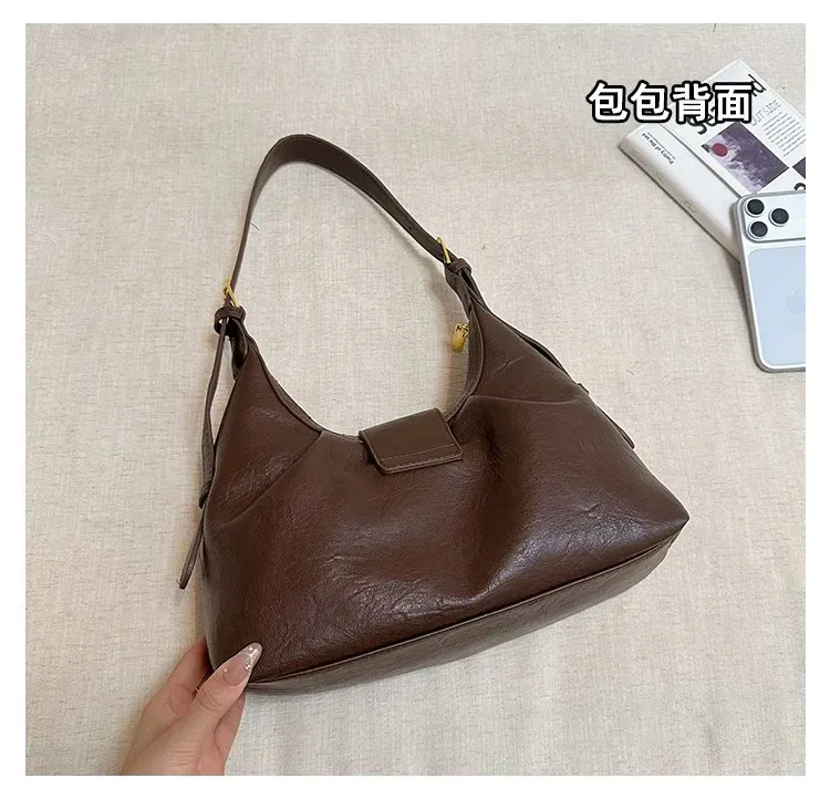 Tas Selempang Wanita Bahan PU Sintetis Polos Model Hobo Tali Panjang Resleting Model Minimalis