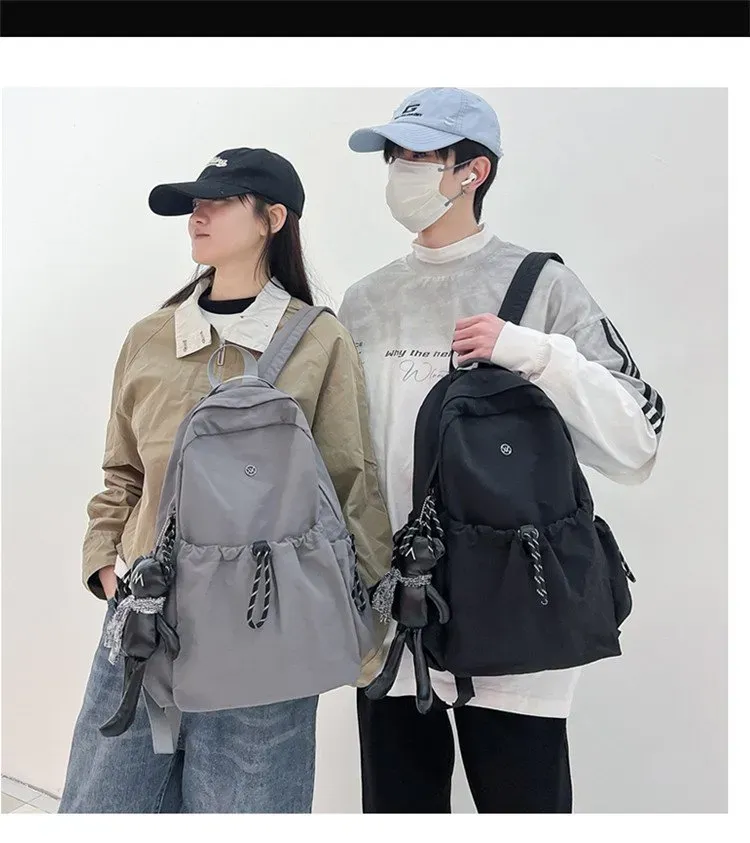 Tas Ransel Wanita Bahan Nylon Polos Warna Hitam Bentuk Kotak Tali Panjang Grosir Import