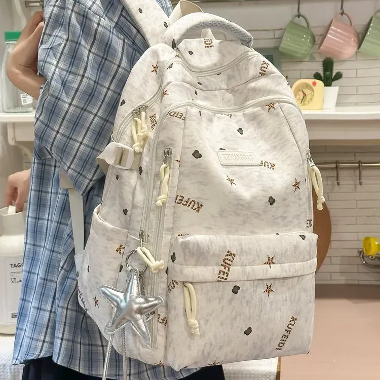 Tas Ransel Wanita Bahan Nylon Motif Print Warna Hitam Bentuk Kotak Tali Lebar Grosir Import