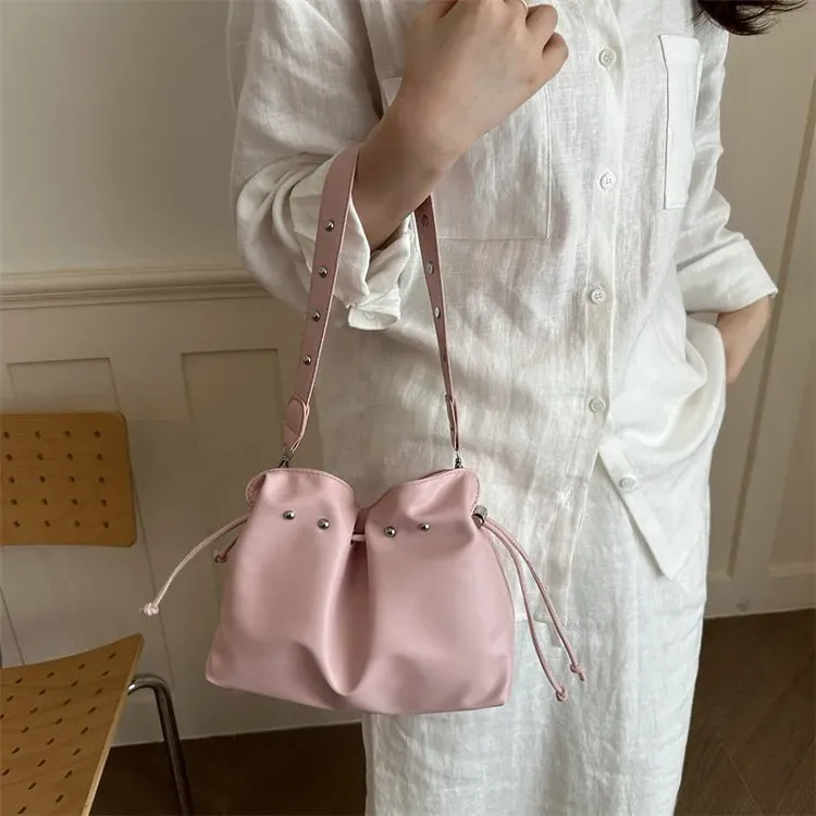 Tas Ransel Wanita Bahan PU Sintetis Polos Warna Putih Bentuk Bulat Tali Panjang Grosir Import