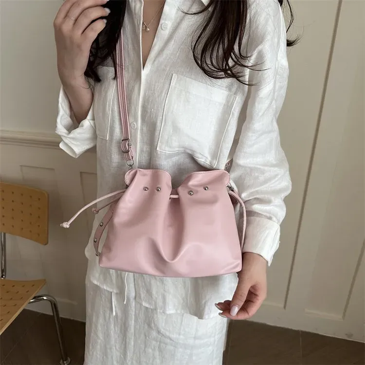 Tas Ransel Wanita Bahan PU Sintetis Polos Warna Putih Bentuk Bulat Tali Panjang Grosir Import