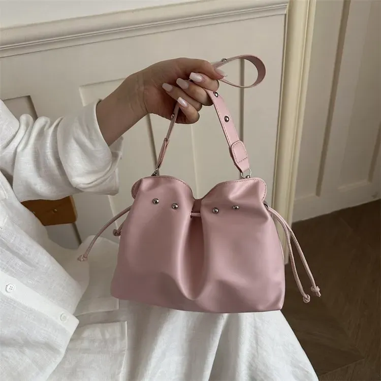 Tas Ransel Wanita Bahan PU Sintetis Polos Warna Putih Bentuk Bulat Tali Panjang Grosir Import