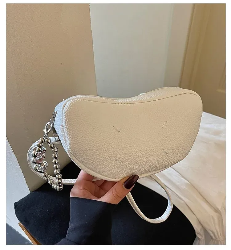 Tas Selempang Wanita Bahan PU Sintetis Polos Bentuk Bulat Tali Panjang Resleting untuk Reseller kategori tas selempang grosir