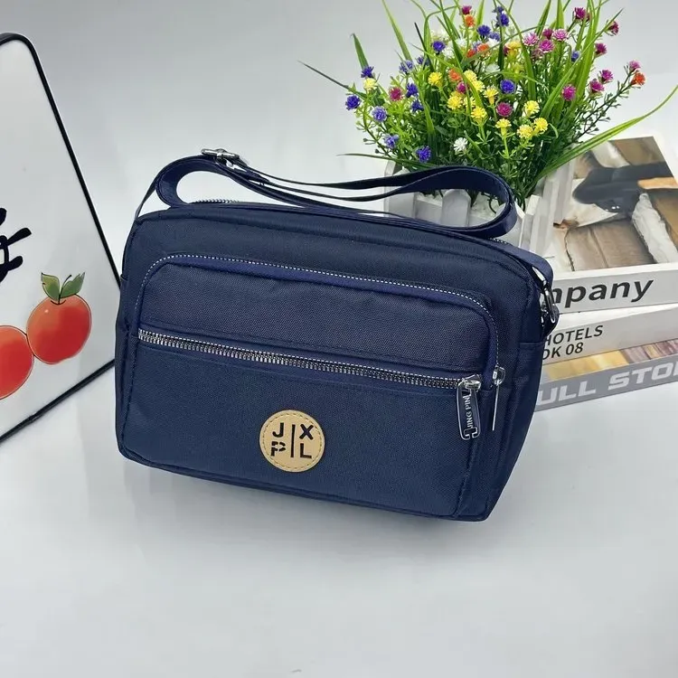 Tas Selempang Wanita Bahan Nylon Polos Warna Biru Bentuk Kotak Tali Panjang Katalog Grosir