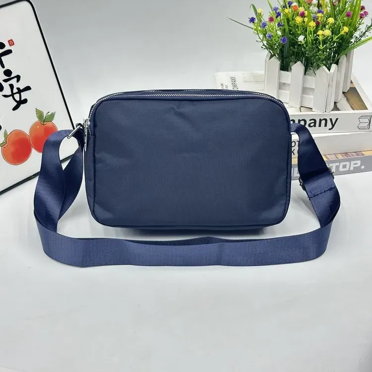 Tas Selempang Wanita Bahan Nylon Polos Warna Biru Bentuk Kotak Tali Panjang Katalog Grosir