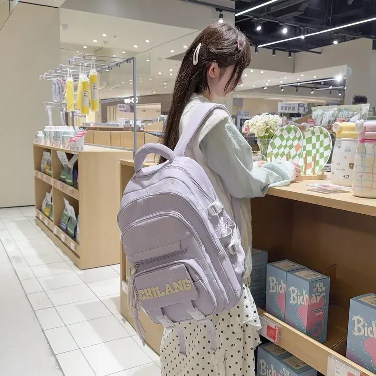 Tas Ransel Wanita Bahan Nylon Polos Warna Ungu Bentuk Kotak Tali Lebar Resleting Motif Floral