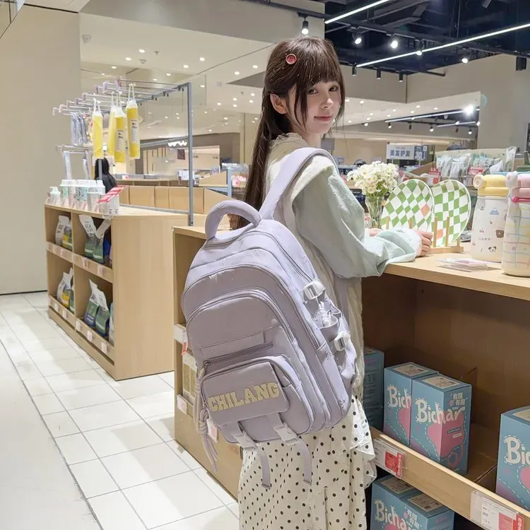 Tas Ransel Wanita Bahan Nylon Polos Warna Ungu Bentuk Kotak Tali Lebar Resleting Motif Floral