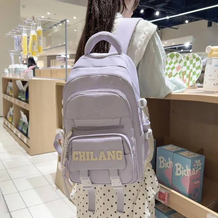 Tas Ransel Wanita Bahan Nylon Polos Warna Ungu Bentuk Kotak Tali Lebar Resleting Motif Floral