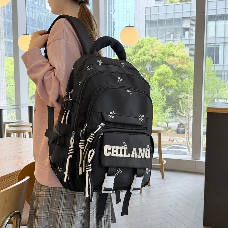 Tas Ransel Wanita Bahan Nylon Polos Warna Ungu Bentuk Kotak Tali Lebar Resleting Motif Floral