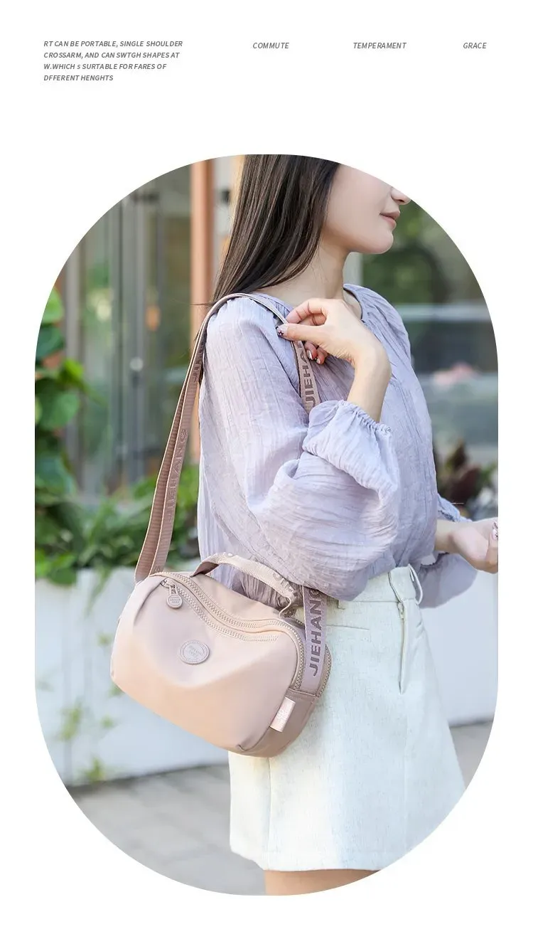 Tas Selempang Wanita Bahan Nylon Polos Warna Pink Bentuk Kotak Tali Panjang Model Import
